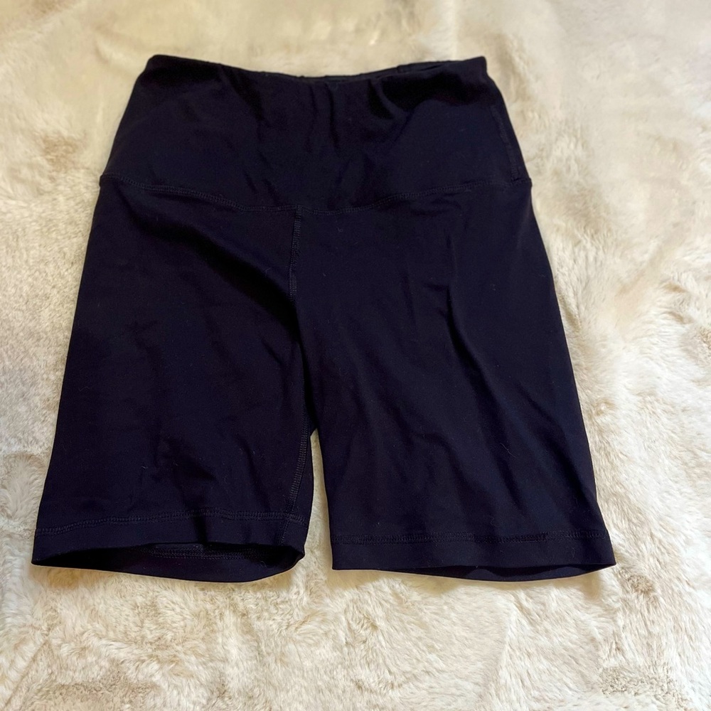 Black and Purple biker shorts with pockets on front left side!